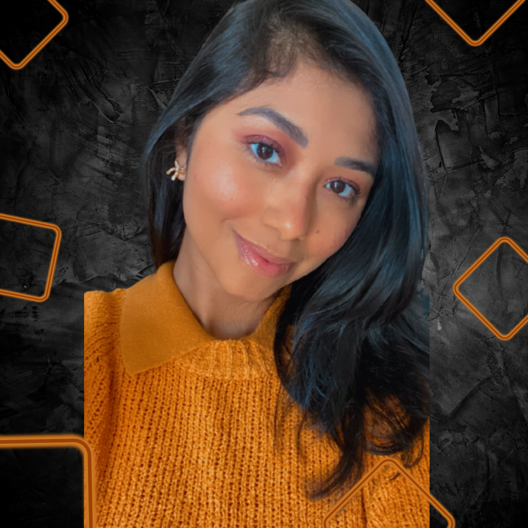 Foto de Raquel, mulher com cabelo preto em um fundo preto
